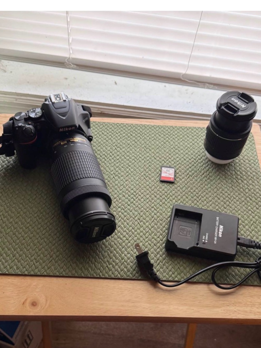 NikonD3500 DSLR Camera with Black Telephoto and Extra Lens
